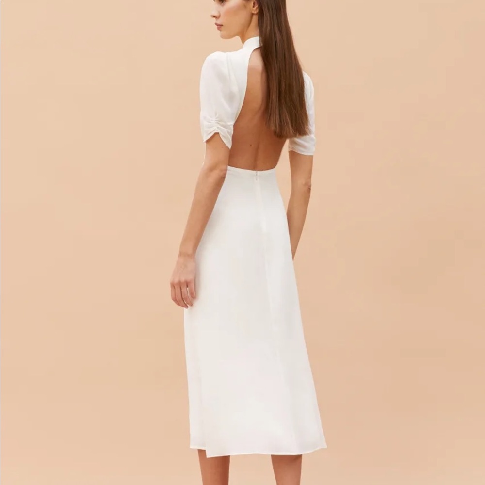 Like new Reformation Dusk Dress size 0 in Ivory.